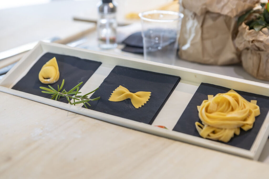 Types of fresh, handmade pasta: tortellino, farfalla, and tagliatelle from Emilia
