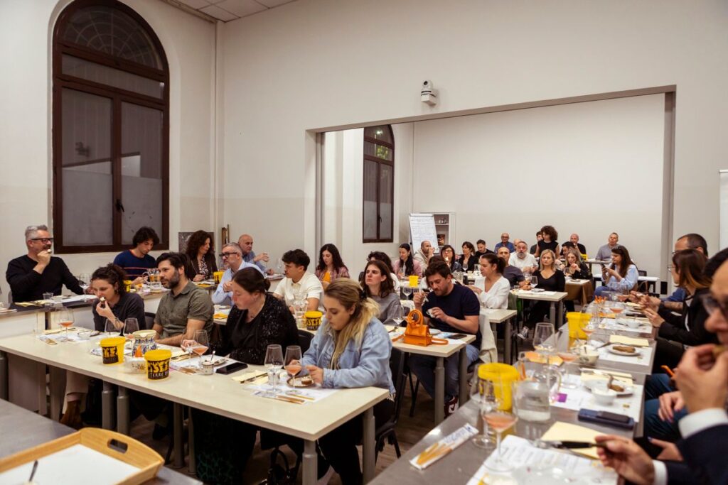 Company employees during a classroom-based sensory wine tasting session