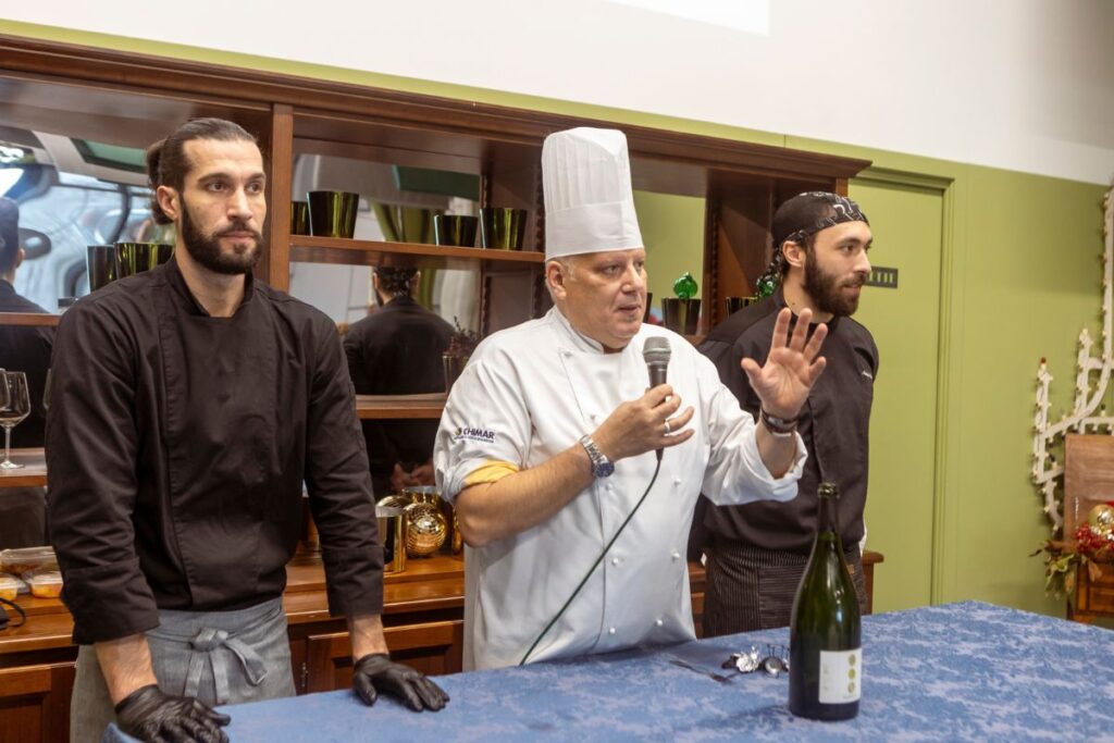 The chef introduces the team to the business during the"In the Kitchen with the Chef" experience