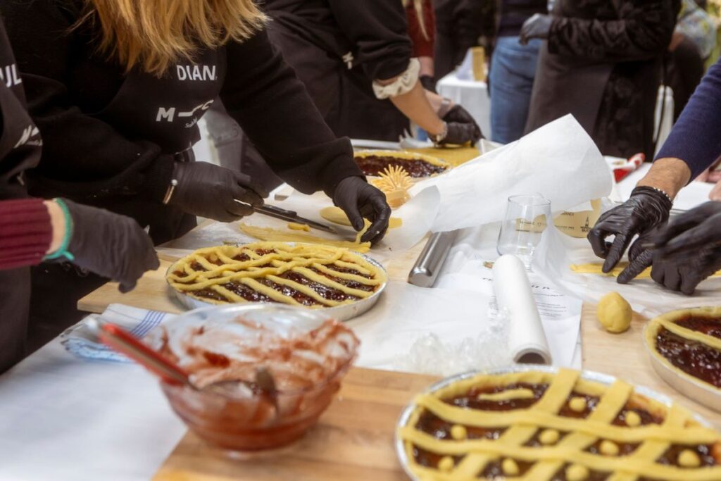 Making tarts during the culinary team-building event"In the Kitchen with the Chef"